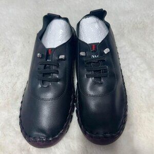 Woman’s fashion sneakers. Brand new. Size 41. Slip on.